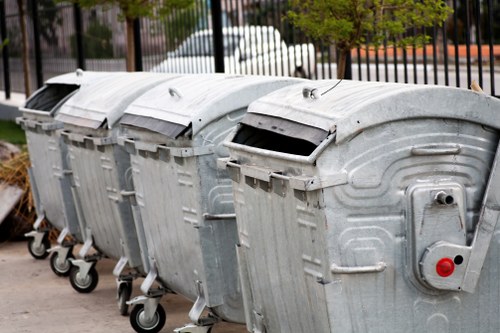 Skip placed on a residential driveway in Parsons Green