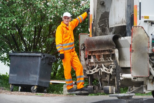 First aider and incident response team at a skip hire scene