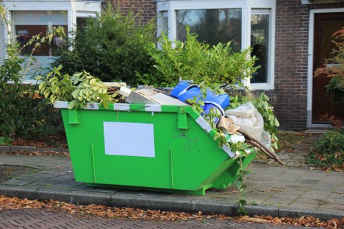 Family using a skip during home renovation
